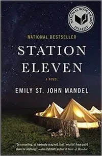 The book cover for *Station Eleven*, a novel by Emily St. John Mandel exploring survival, art, and humanity in a post-apocalyptic world.  